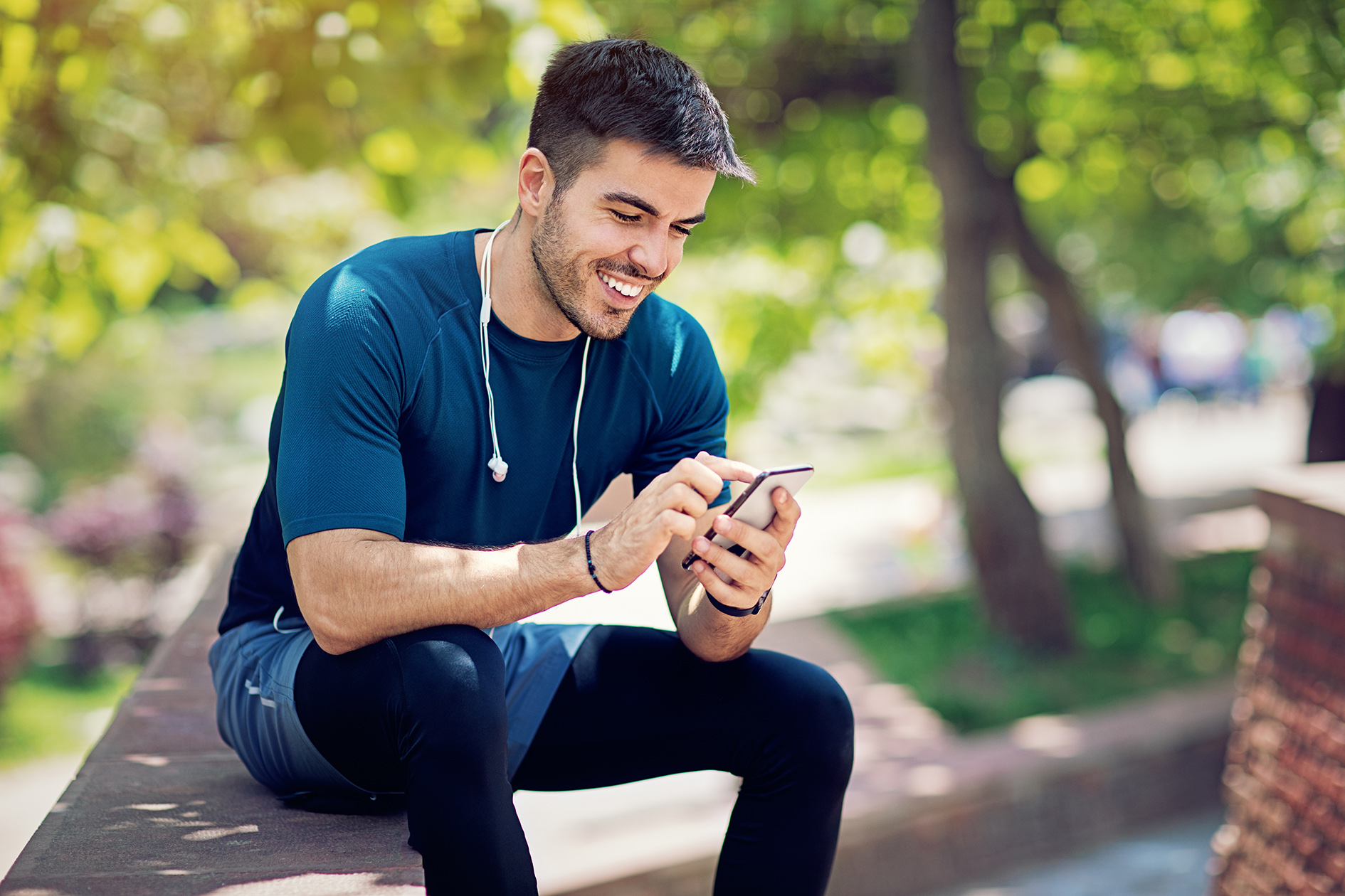 Man using his mobile phone to access his benefits - Benify